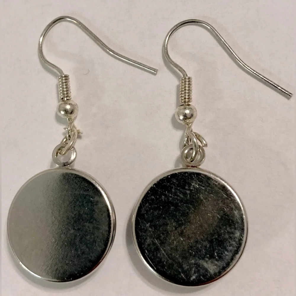 Women's pendant earrings , Earrings in the shape of the moon and angel